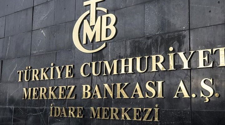 Merkez Bankası binasının girişinde yer alan tabelası, mermer ve siyah arka planda yer alıyor.
